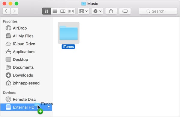 drag itunes folder to external hard drive